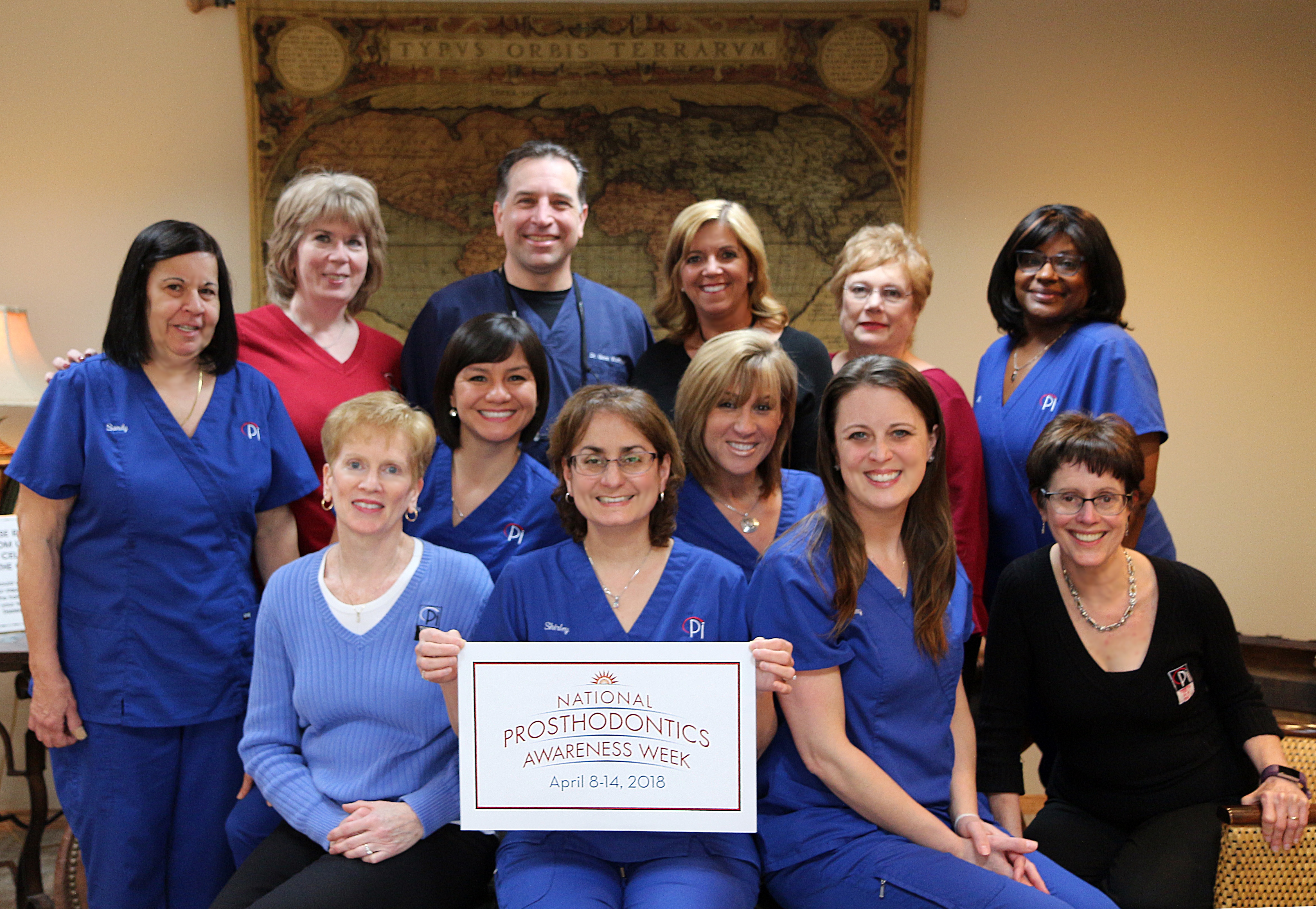 The Pi Dental Center team celebrates National Prosthodontics Awareness Week