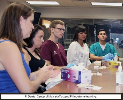 Pi Dental Center clinical team attends phlebotomy training.